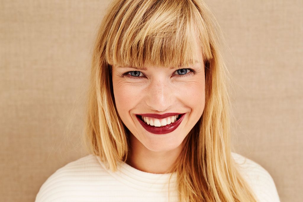 mature-woman-smiling-with-lipstick