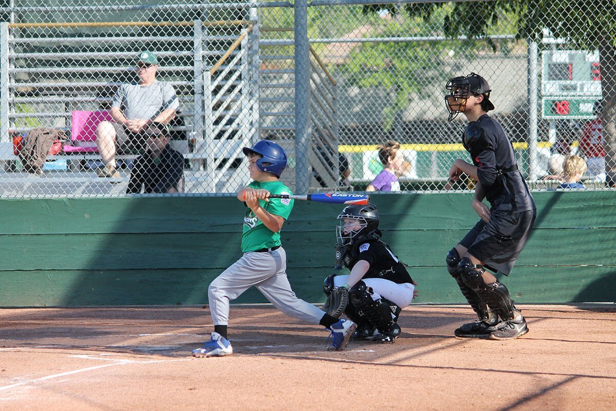 Dragons Little League batter hits home run