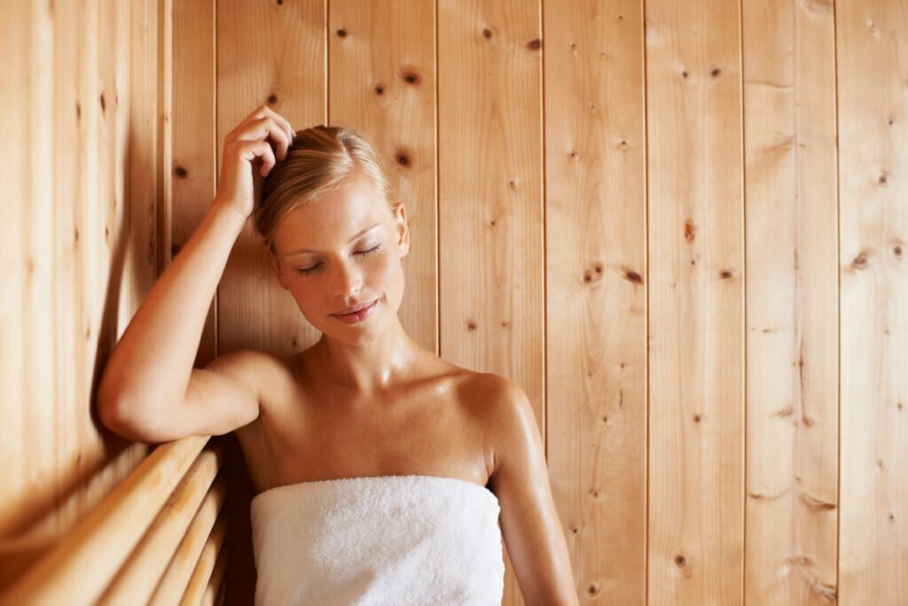 Woman Relaxing in a Sauna for a Number of Health Benefits