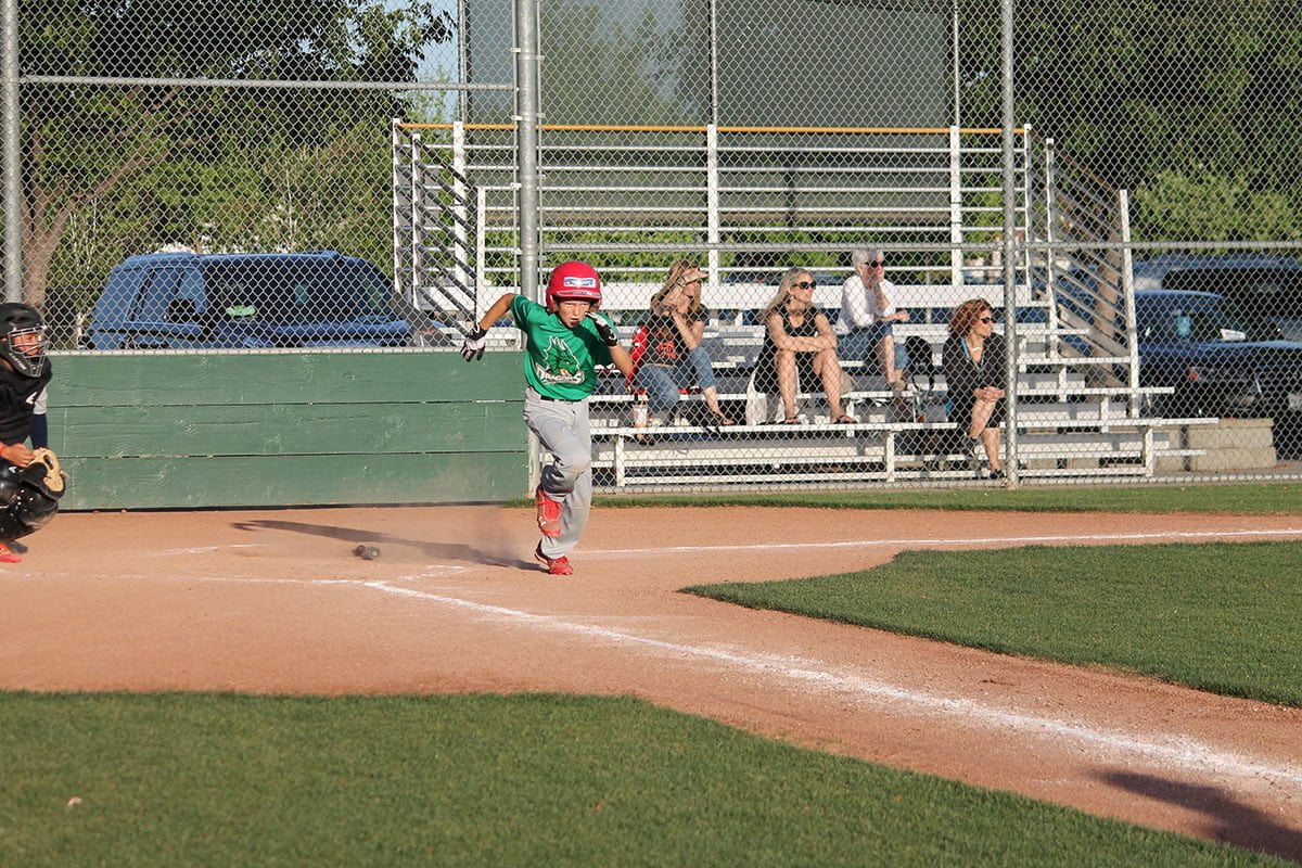 Lakeside Little League Dragons player running