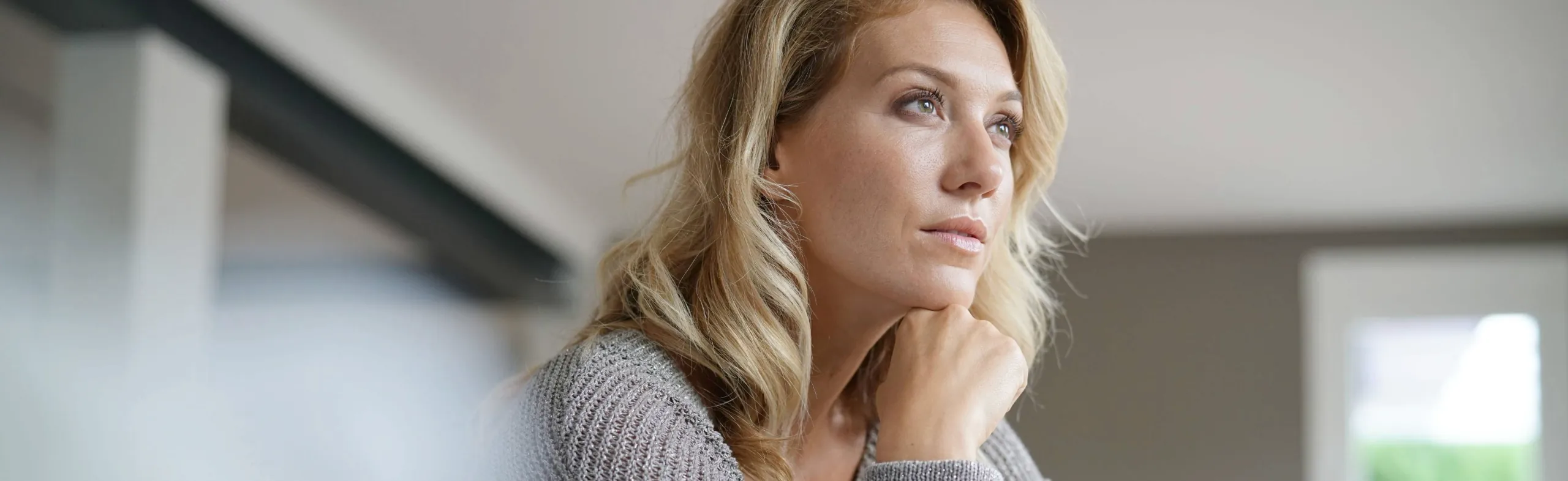 oblique view of beautiful middle-aged woman
