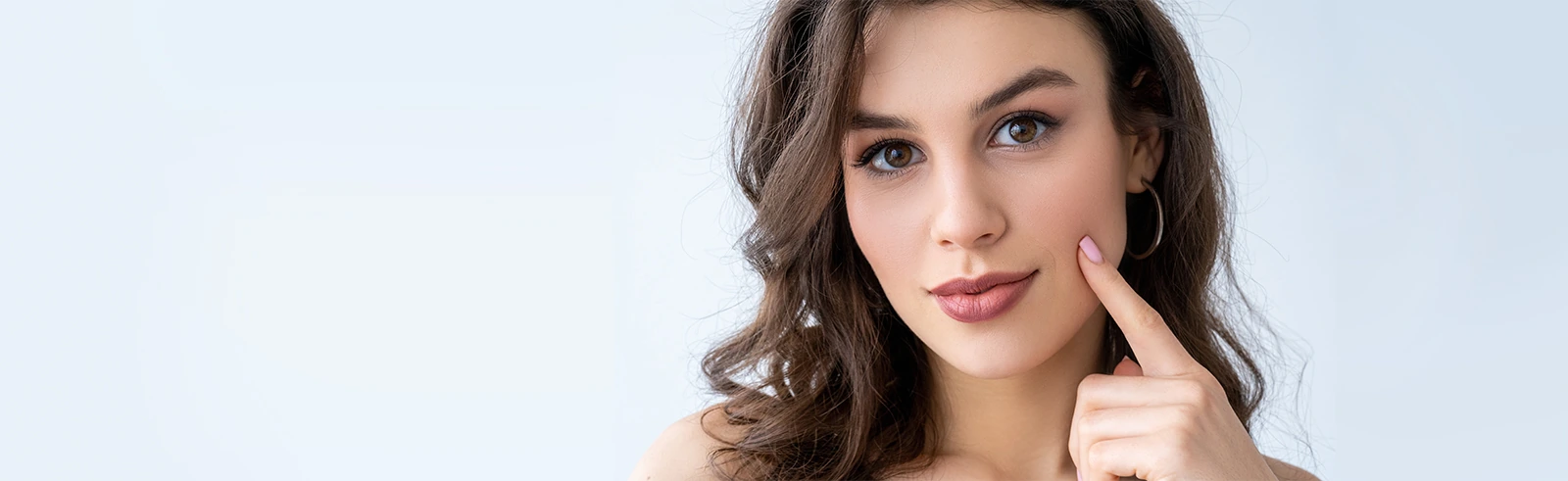 attractive woman touching cheek