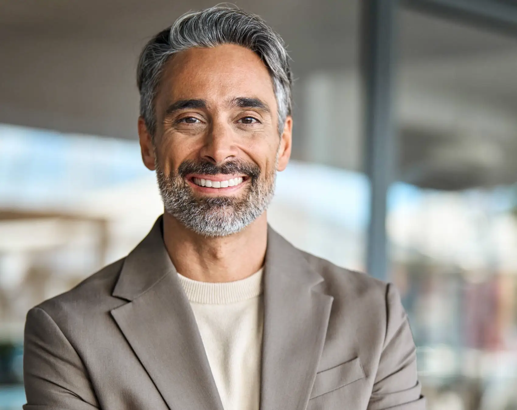 confident mature businessman smiling