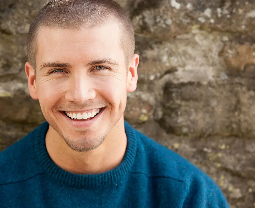 attractive young man smiling