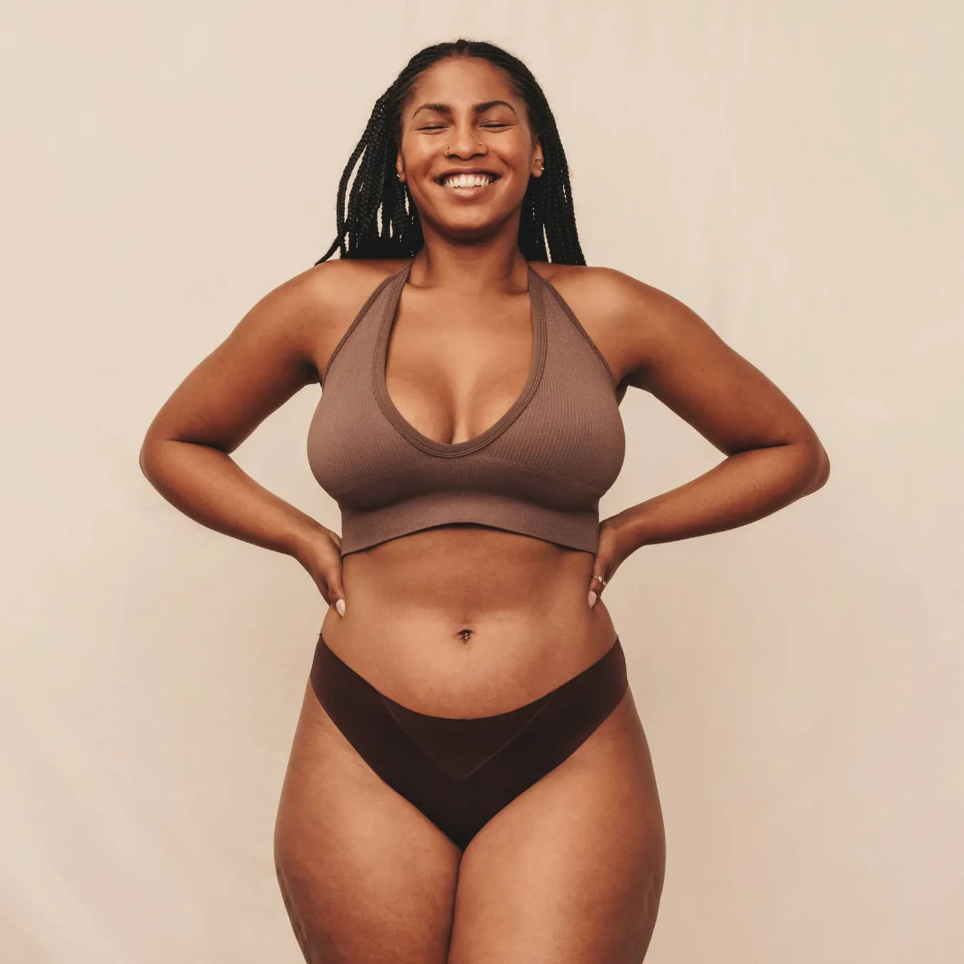 curvy woman in underwear with flat abdomen