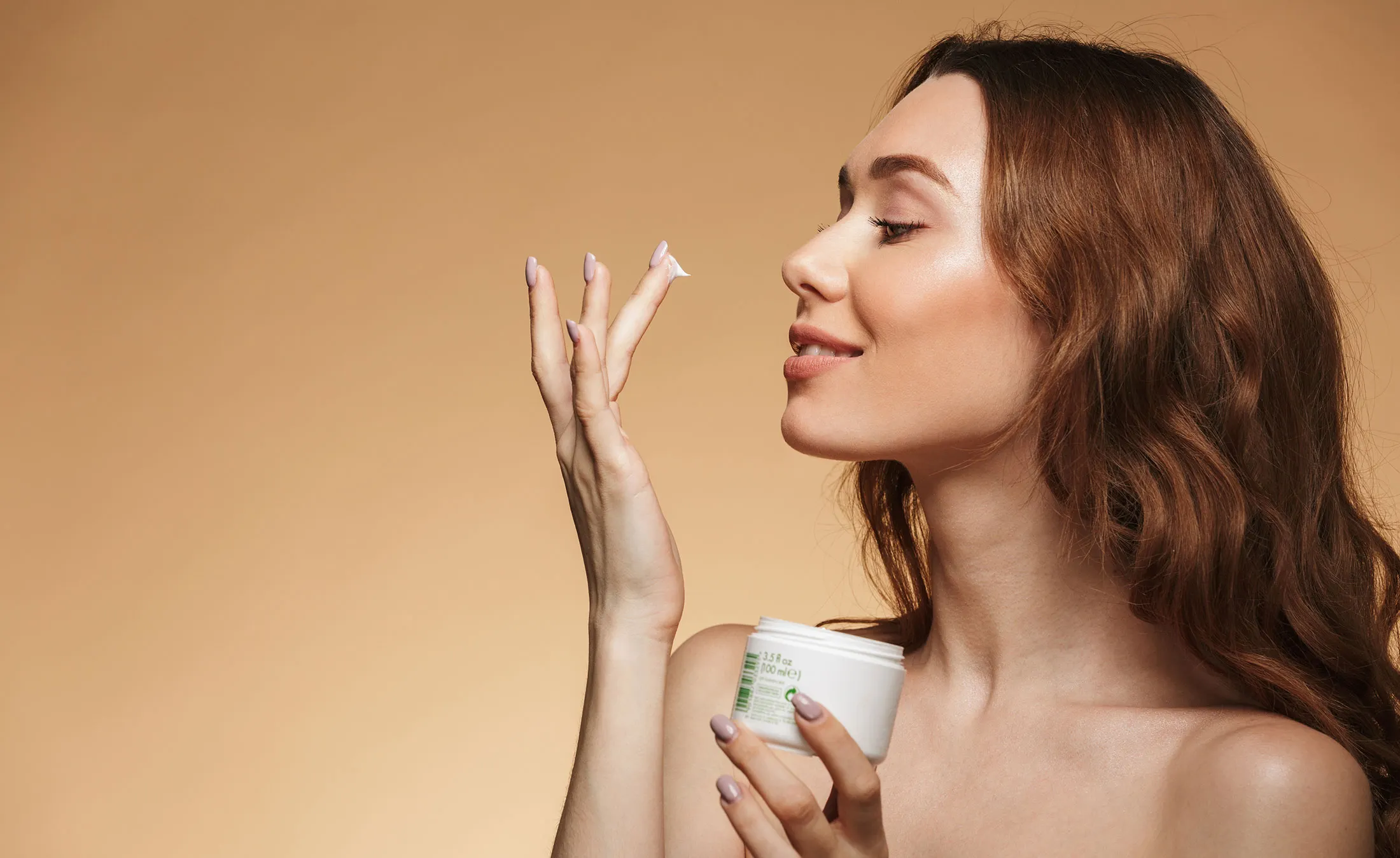 pretty young lady take care of her skin