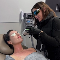 Granite Bay Cosmetics provider giving IPL treatment