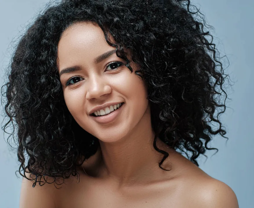 young beautiful woman with dark skin type and clear complexion