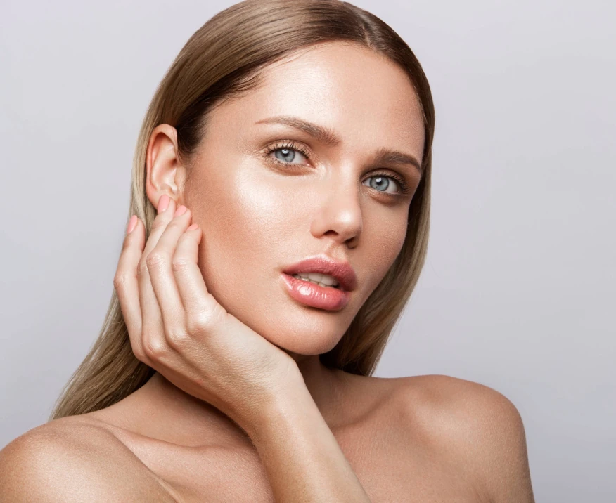 middle-aged woman showcasing wrinkle-free face