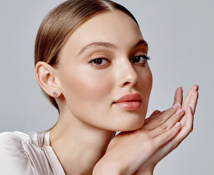 young woman wearing studded earring