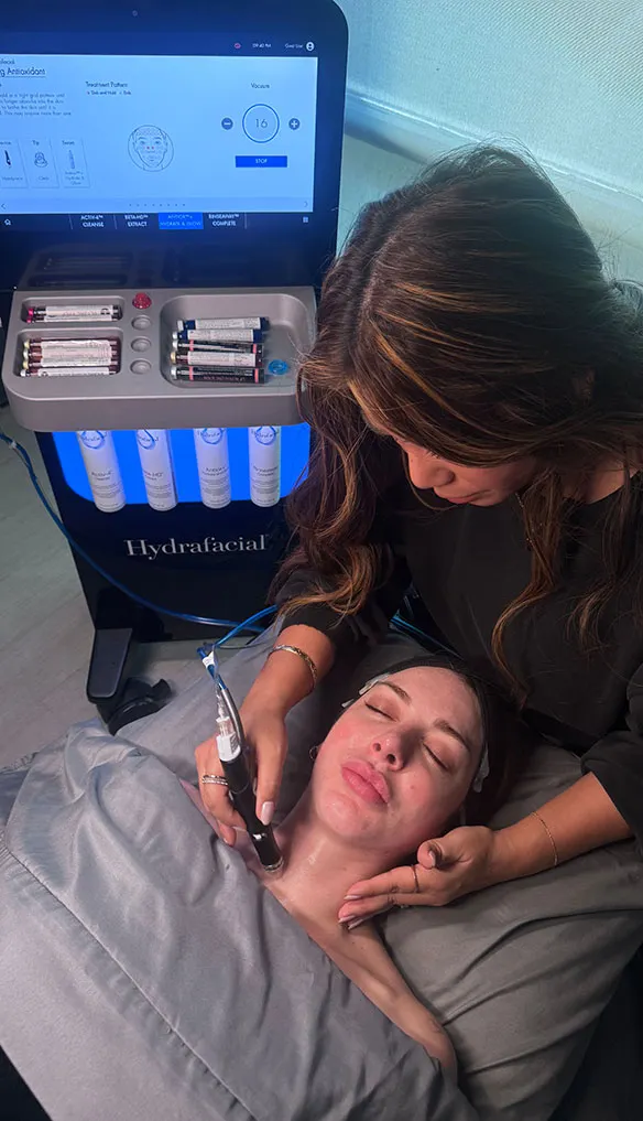 Patient receiving a hydrafacial